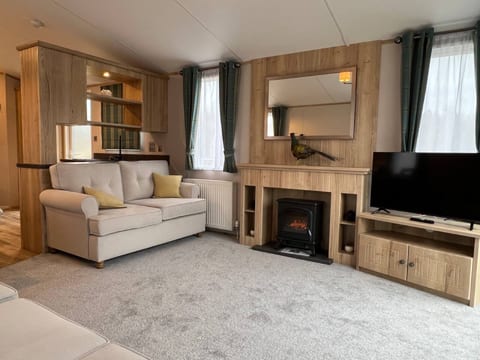 Pillow-back sofas by the fire